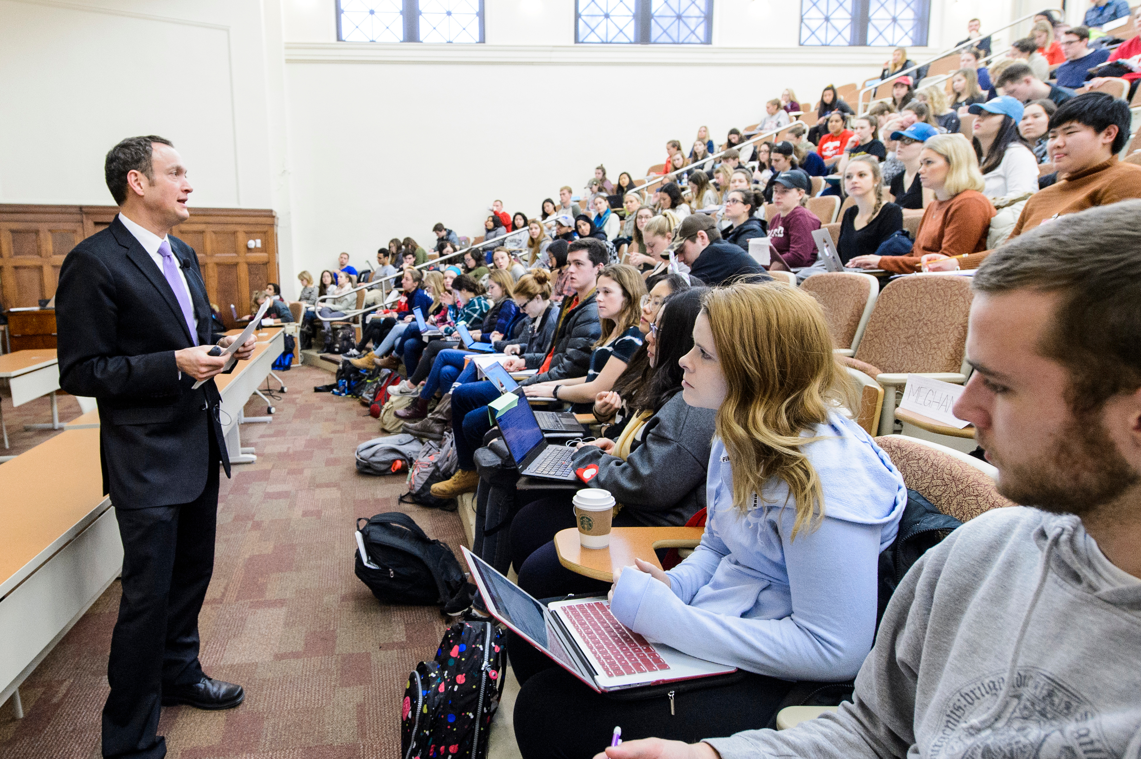Professor Ralph Grunewald speaking to classroom.
