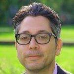 Headshot photo of Chad Alan Goldberg.